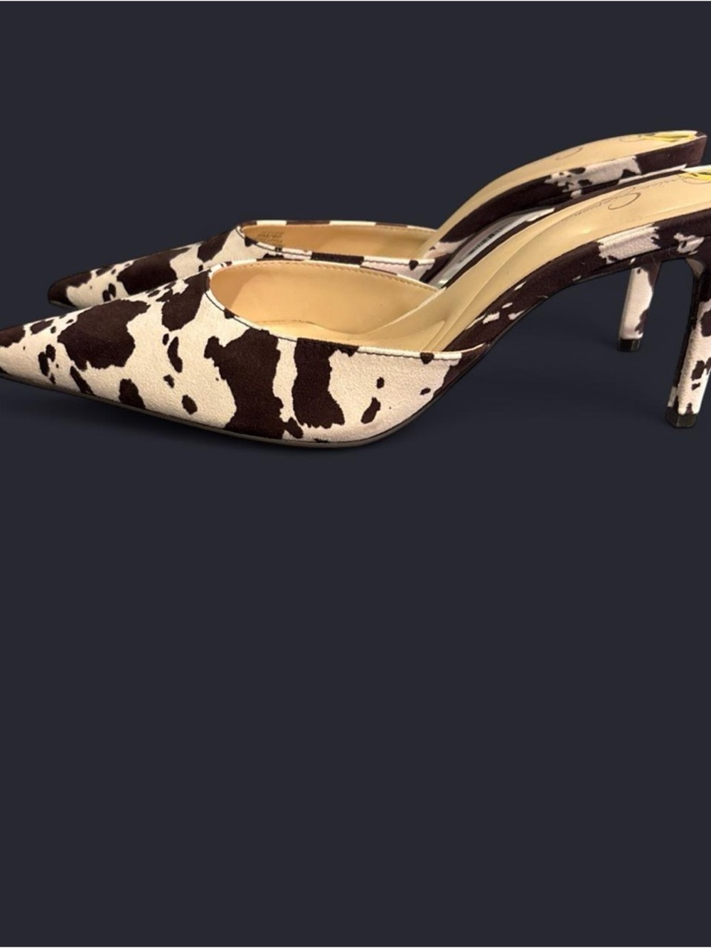 Jessica Simpson Cow-Print Pointed Toe Mules in Brown & White